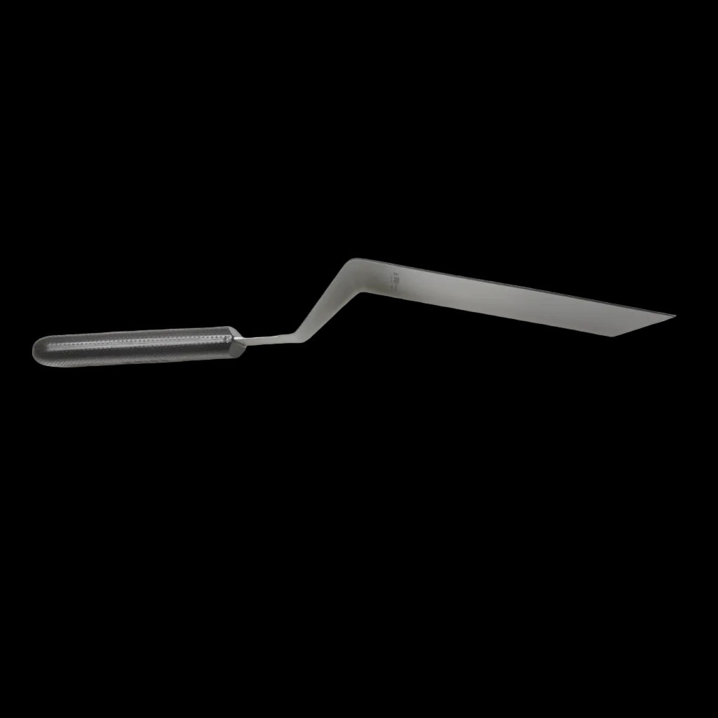 Hamburger turner with angled stainless spatula blade and dark textured handle