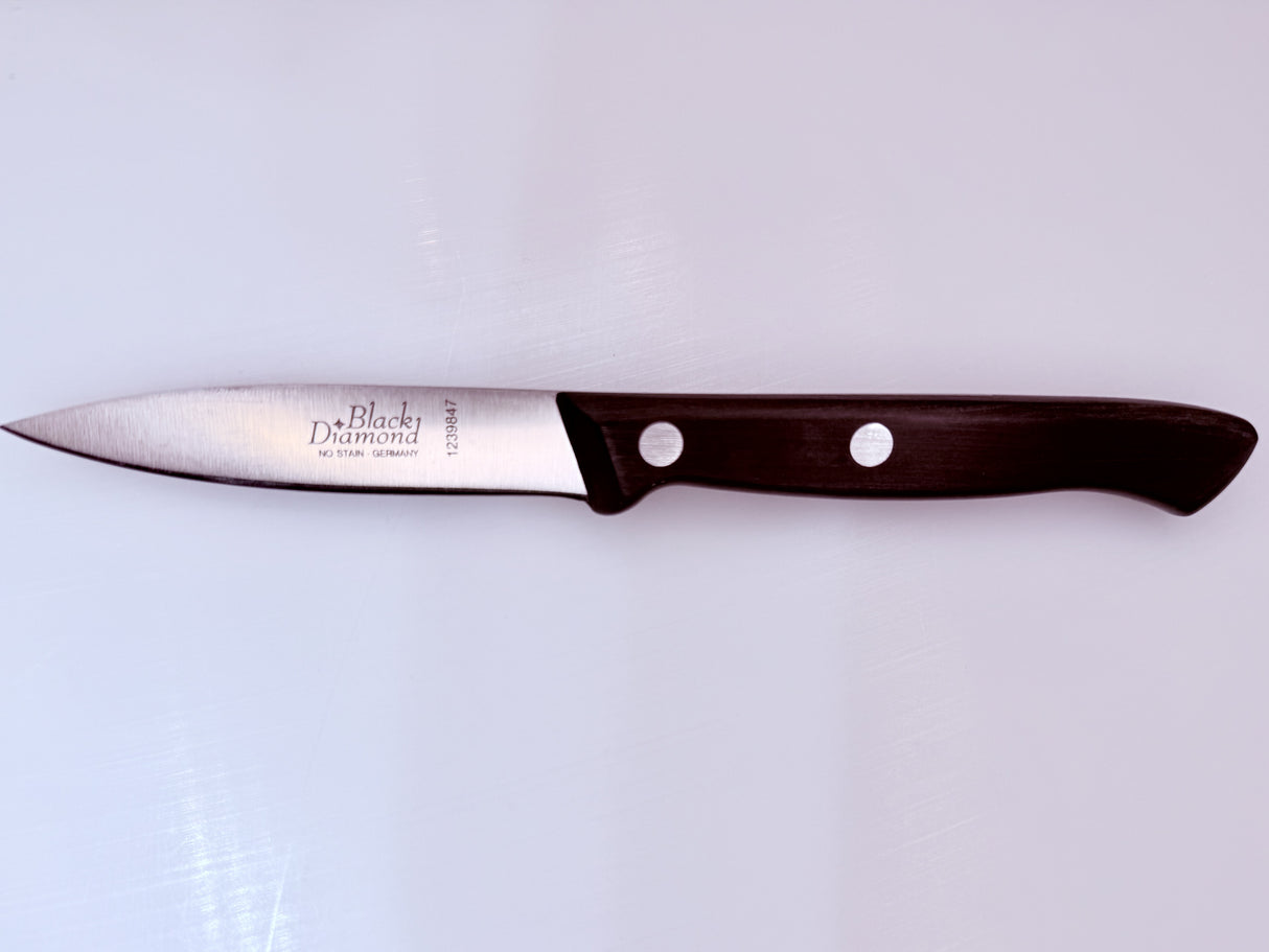 Paring knife with dark brown handle and polished steel blade
