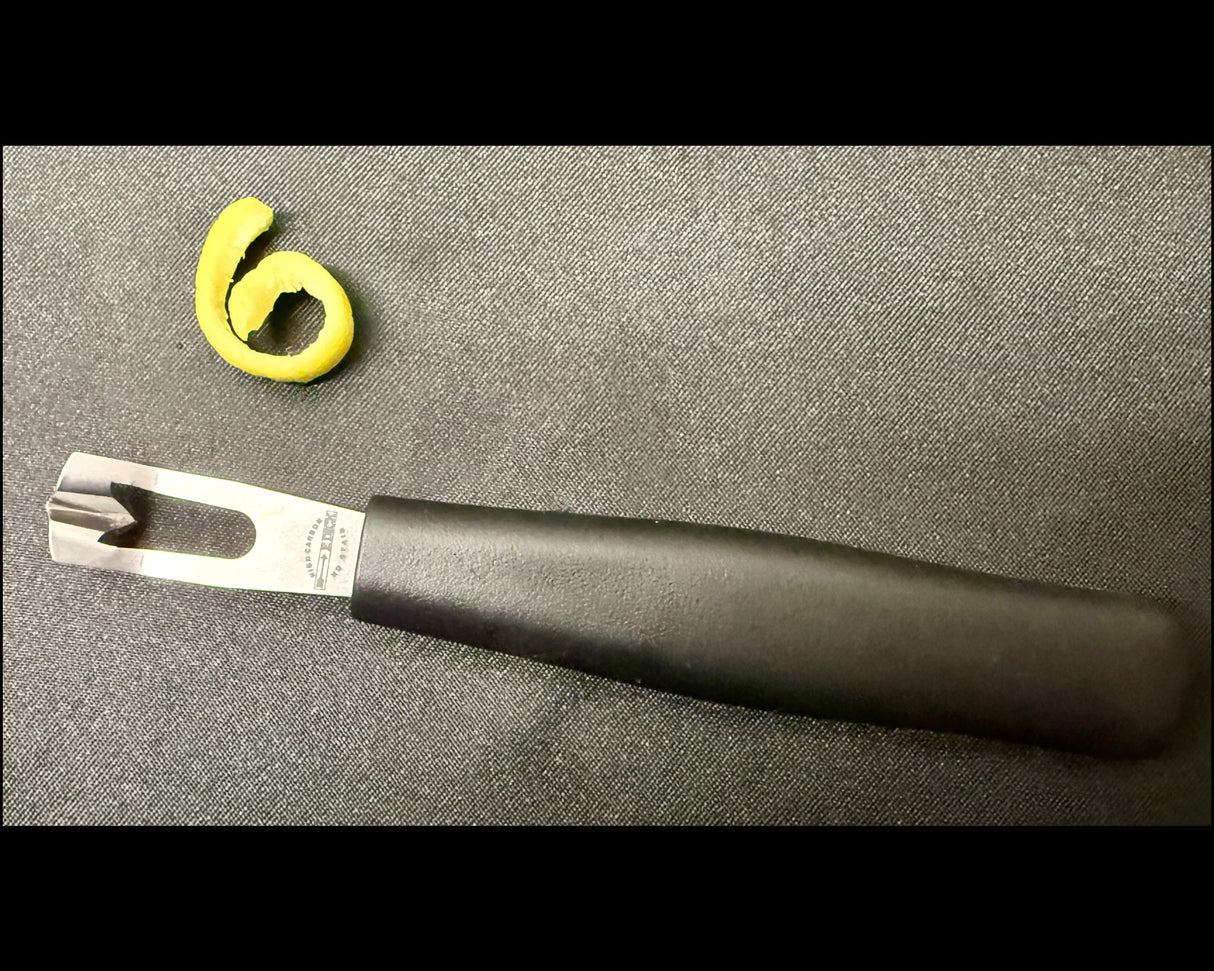 F. DICK black-handled channel knife close-up of blade