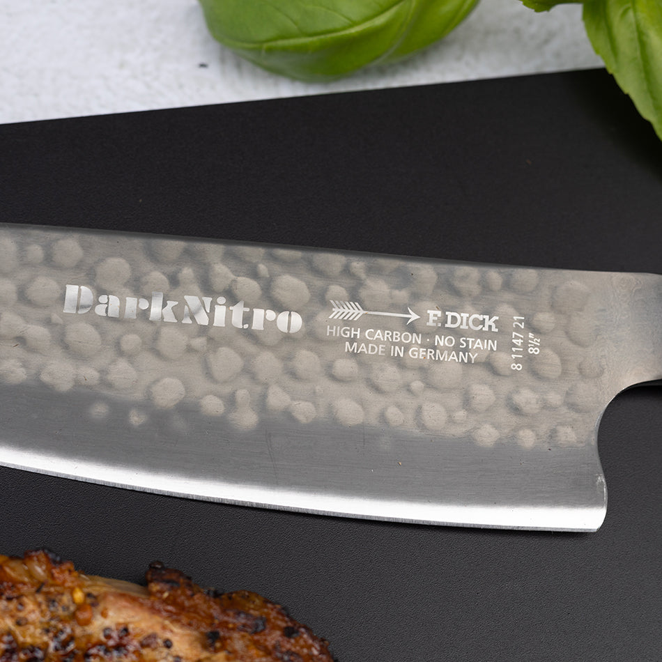 DarkNitro chef knife blade close-up with etched text and hammered pattern
