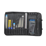 CookUp black roll-up culinary kit pouch open with multiple utensils in clear sleeves