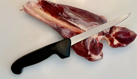 F.Dick Eurocut boning knife, black handle and narrow blade at side angle