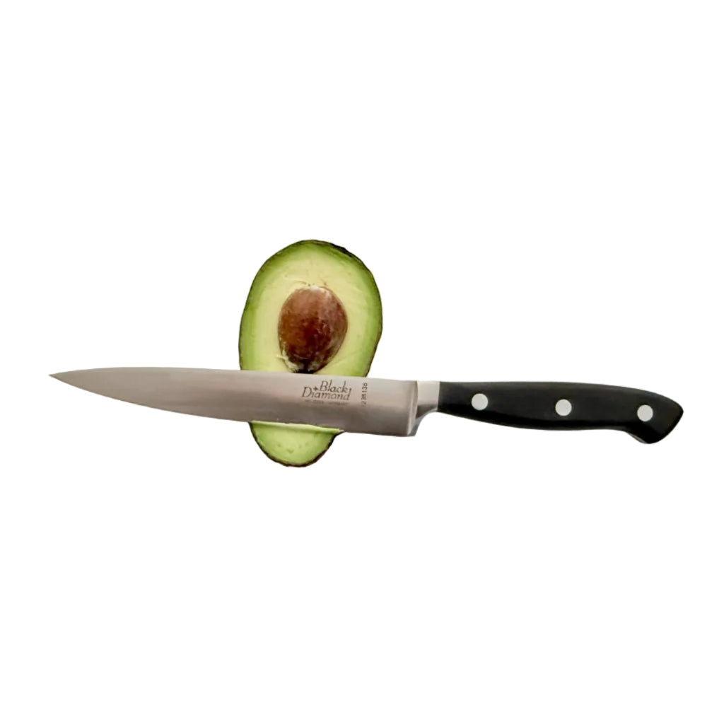 Kitchen slicer knife with stainless blade and black handle, shown with produce