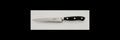 Knife with a black handle on a white background
