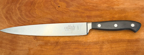 F.Dick Black Diamond slicer kitchen knife with silver blade and black handle, three rivets