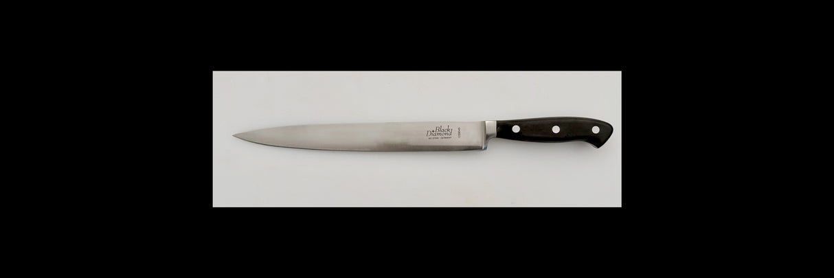 Kitchen slicer knife with stainless blade and black handle, white rivets detail
