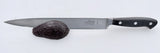 Kitchen slicer knife with stainless blade and black handle with white rivets