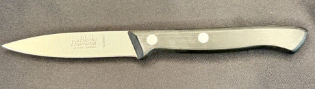 Forged paring knife with pale handle and logo-marked steel blade