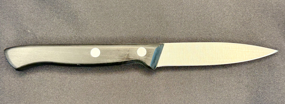 Paring knife with light handle and polished steel blade, riveted grip