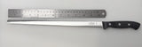 Carving slicer knife with black handle and long, narrow steel blade