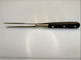 Forged meat fork with black handle and three rivets, two pointed tines