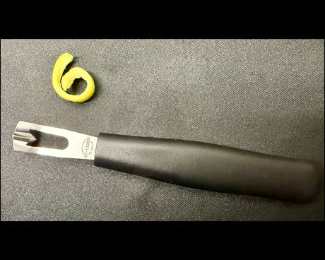 F. DICK black-handled channel knife close-up of blade