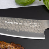 DarkNitro chef knife blade close-up with etched text and hammered pattern