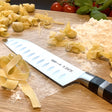 F.Dick 1905 Santoku knife with black handle, kullenschliff blade
