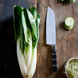 F.Dick Santoku kitchen knife with black handle and hollow-ground blade