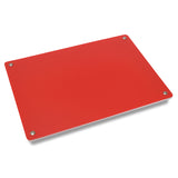 Red cutting board sheet close-up with metal corner grommets