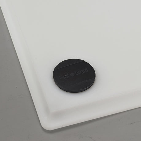 White cutting board sheet corner with black protective cap