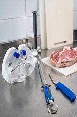 12-inch sharpening steel with blue handle and ring grip on countertop