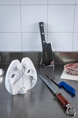 DICKORON knife with black-and-red handle and silver blade on kitchen counter