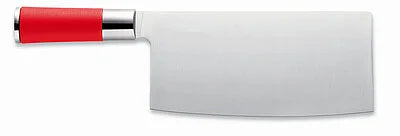 Stainless chef knife blade with red handle, angled close-up.