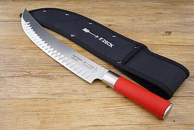 F.Dick knife sheath, black with snap buttons, opened to show serrated blade edge