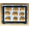 Half-size silicone baking mat CookUP in baking tray with pastries