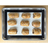 Half-size silicone baking mat CookUP in baking tray with pastries